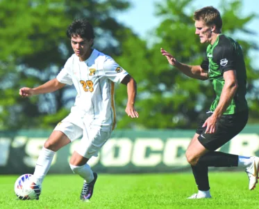 Road tie at GLIAC leader: 2nd-place NMU men’s soccer keeps pace with 1-1 tie